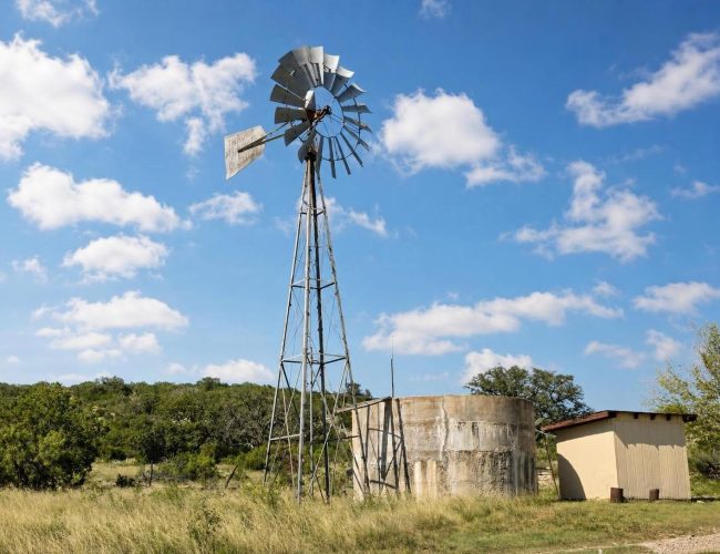 3E Ranch windmill, concrete water tank, and small shed, Edwards County, Texas